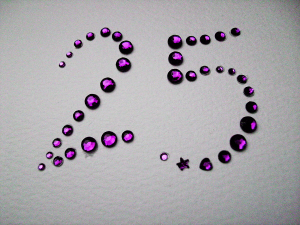 25 writen in purple gems
