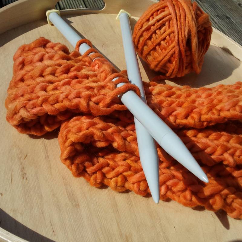 15mm knitting needles with super thick orange yarn